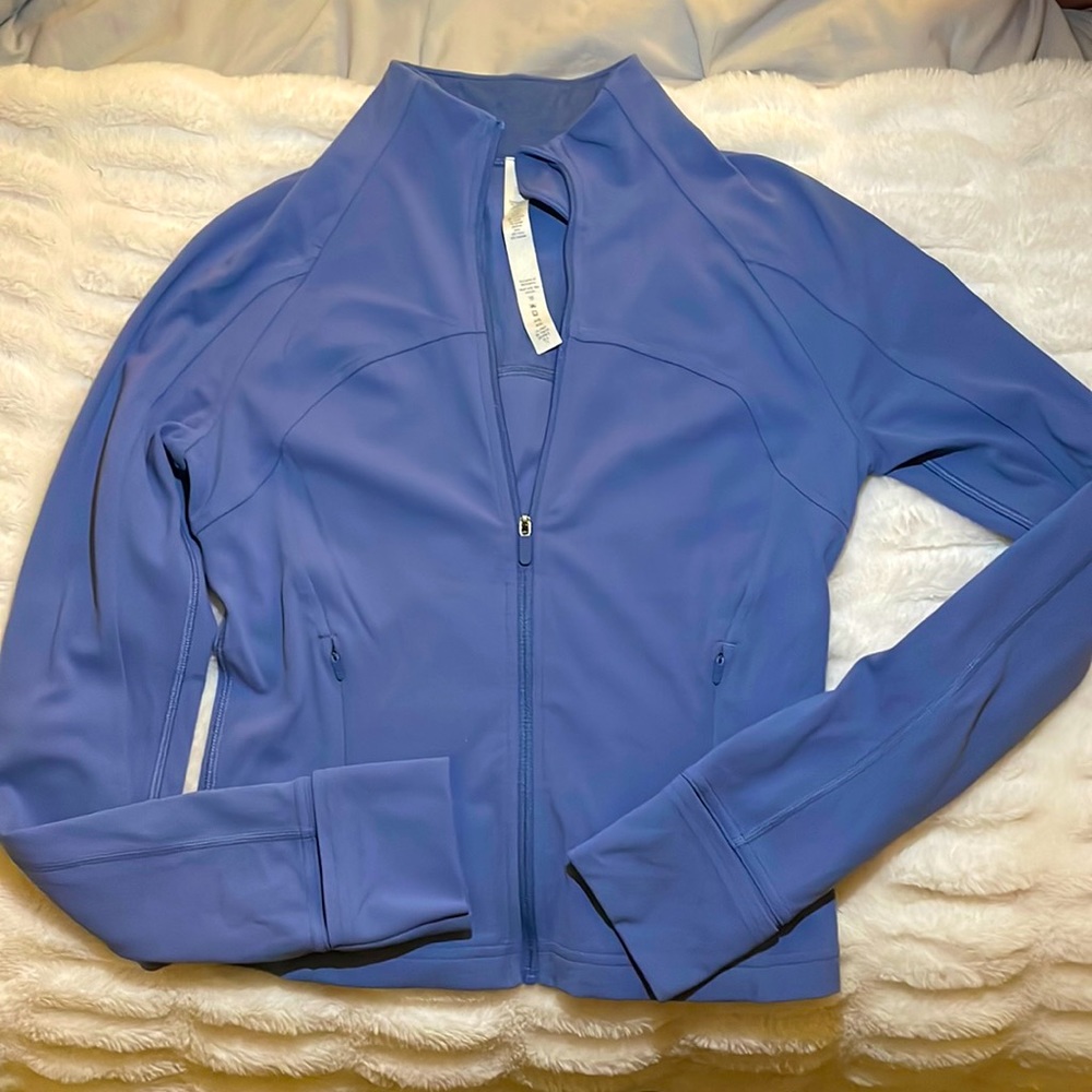 Blue Lululemon jacket.